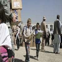 Children receiving their school supplies